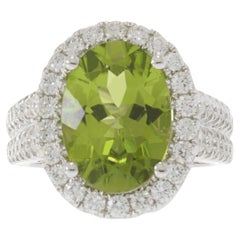 14KT Ring aus Weißgold mit Peridot und Diamant