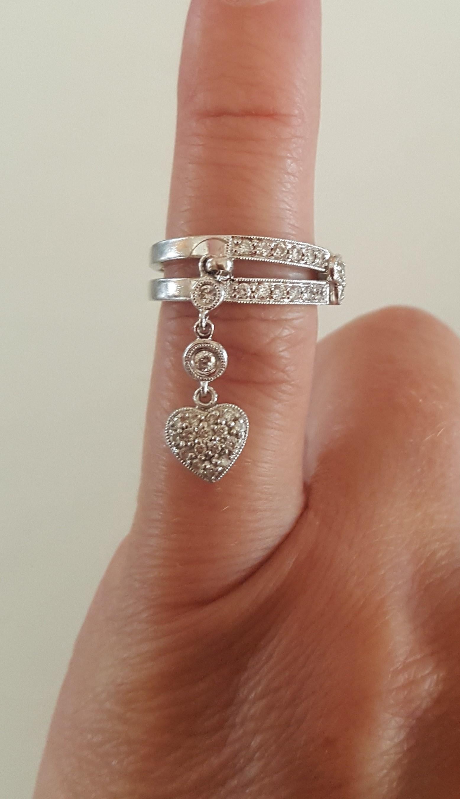 ring with hanging charm