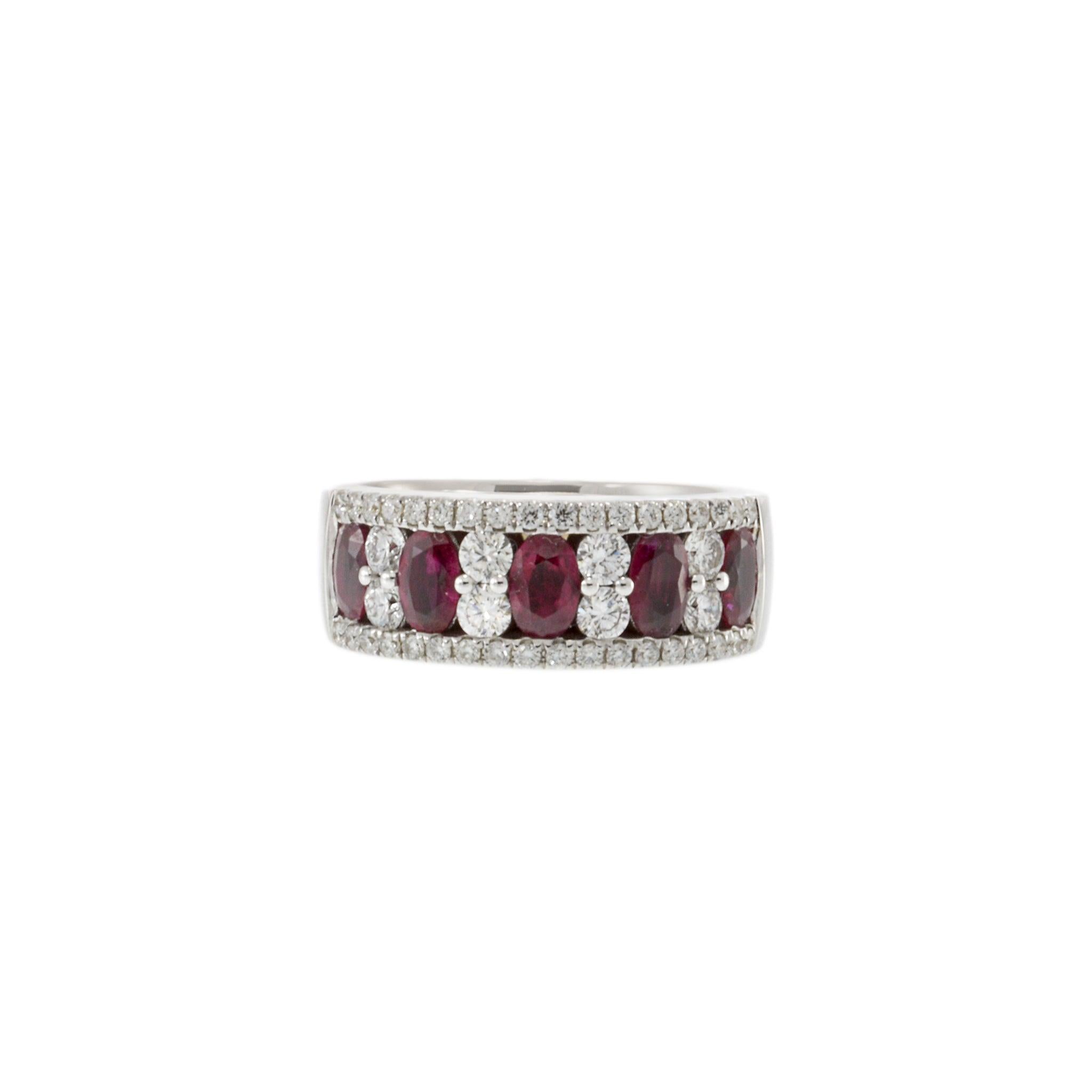 14KT White Gold Ring with Alternating Round Cut Diamonds and Rubies. This elegant ring features 0.77 carats total weight of VS round cut diamonds and 1.40 carats total weight of vibrant rubies. Crafted from luxurious 14KT white gold, the alternating