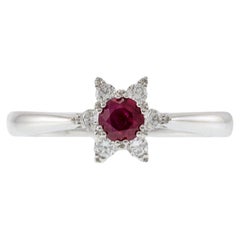 14KT White Gold Round Cut Diamond and Ruby Center Starburst Ring
