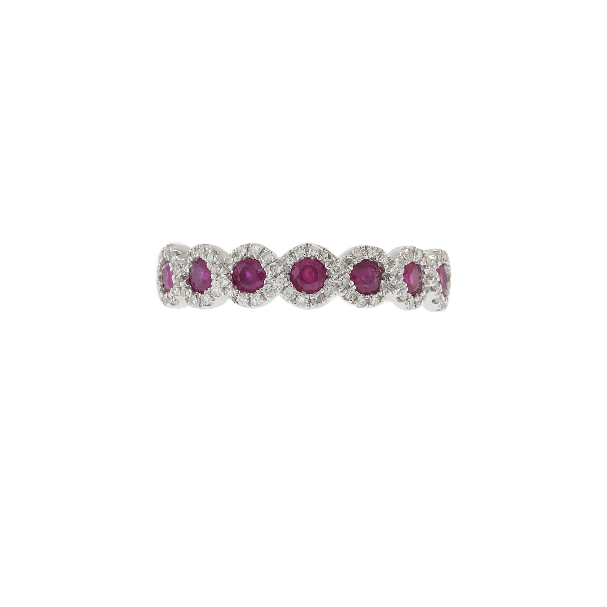 This elegant ring features a 0.52 carat round cut ruby, beautifully set in 14KT white gold. The ruby is complemented by 0.20 carats of round cut diamonds, adding a touch of sparkle and sophistication. Perfect for any occasion, this ring is a