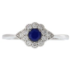 14KT White Gold Round Cut Diamond and Sapphire Flower Ring