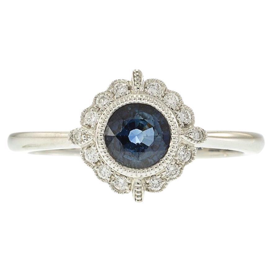 14KT White Gold Round Sapphire and Diamond Halo Ring