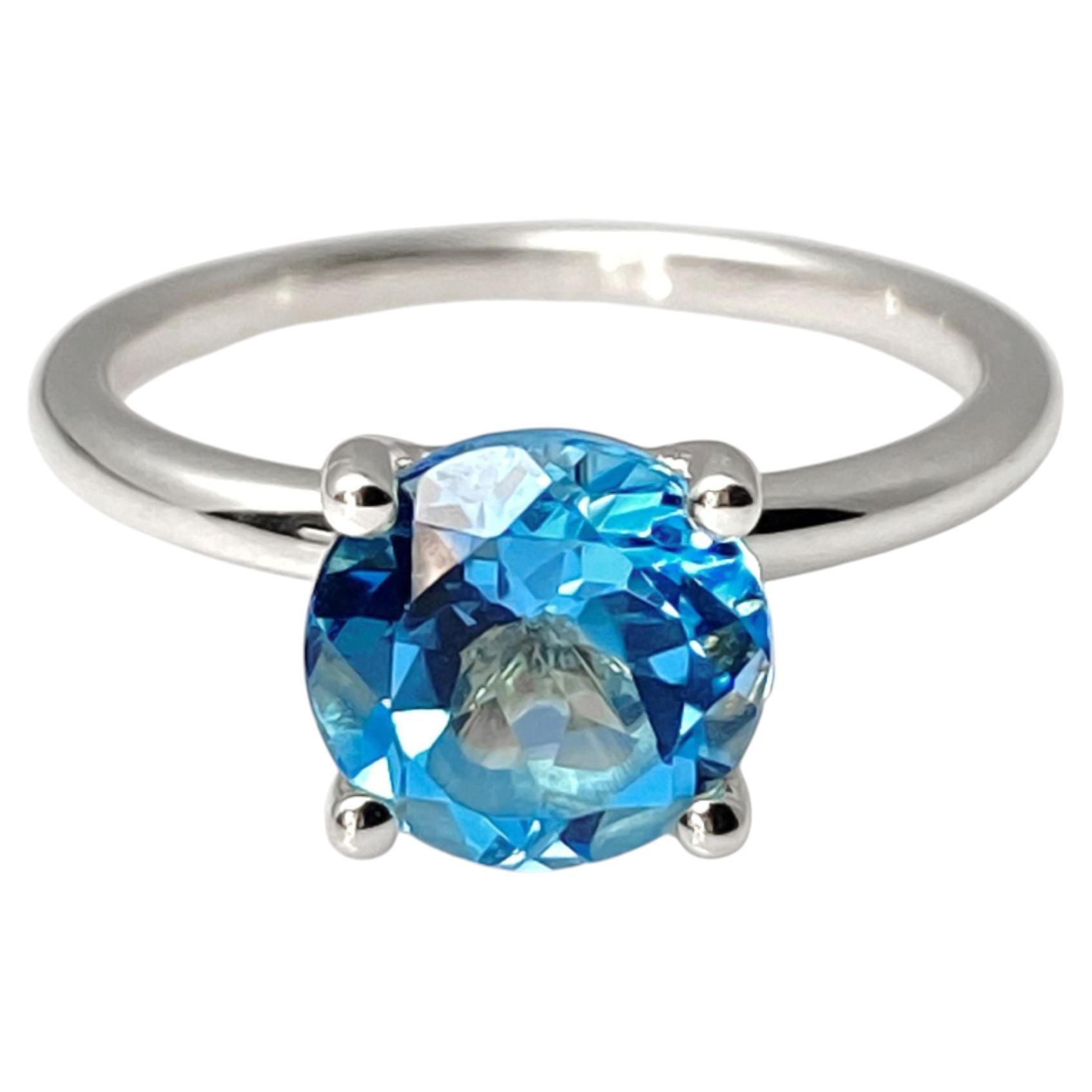 14KT White Gold Round Swiss Blue Topaz Solitaire Ring For Sale