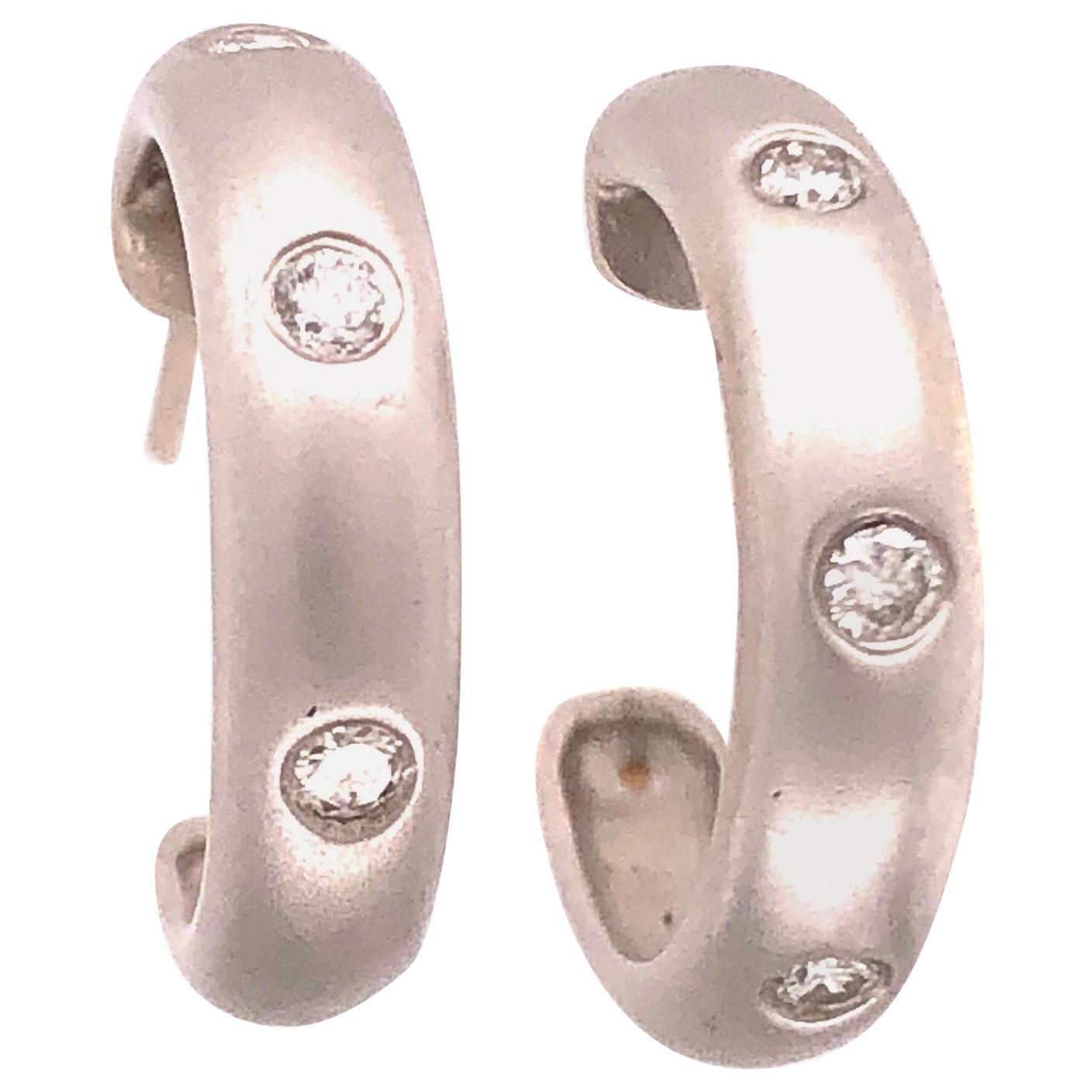 14 Karat White Gold Round Three Diamond Earrings For Sale