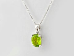14KT White Gold Solitaire Oval Cut Peridot Solitaire Pendant Necklace