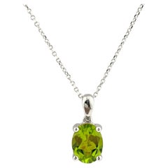 14KT White Gold Solitaire Oval Cut Peridot Solitaire Pendant Necklace