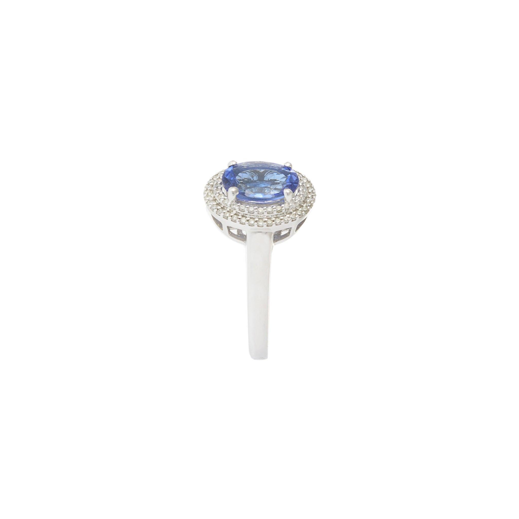 Taglio ovale Anello aureola in oro bianco 14KT con tanzanite e diamanti in vendita
