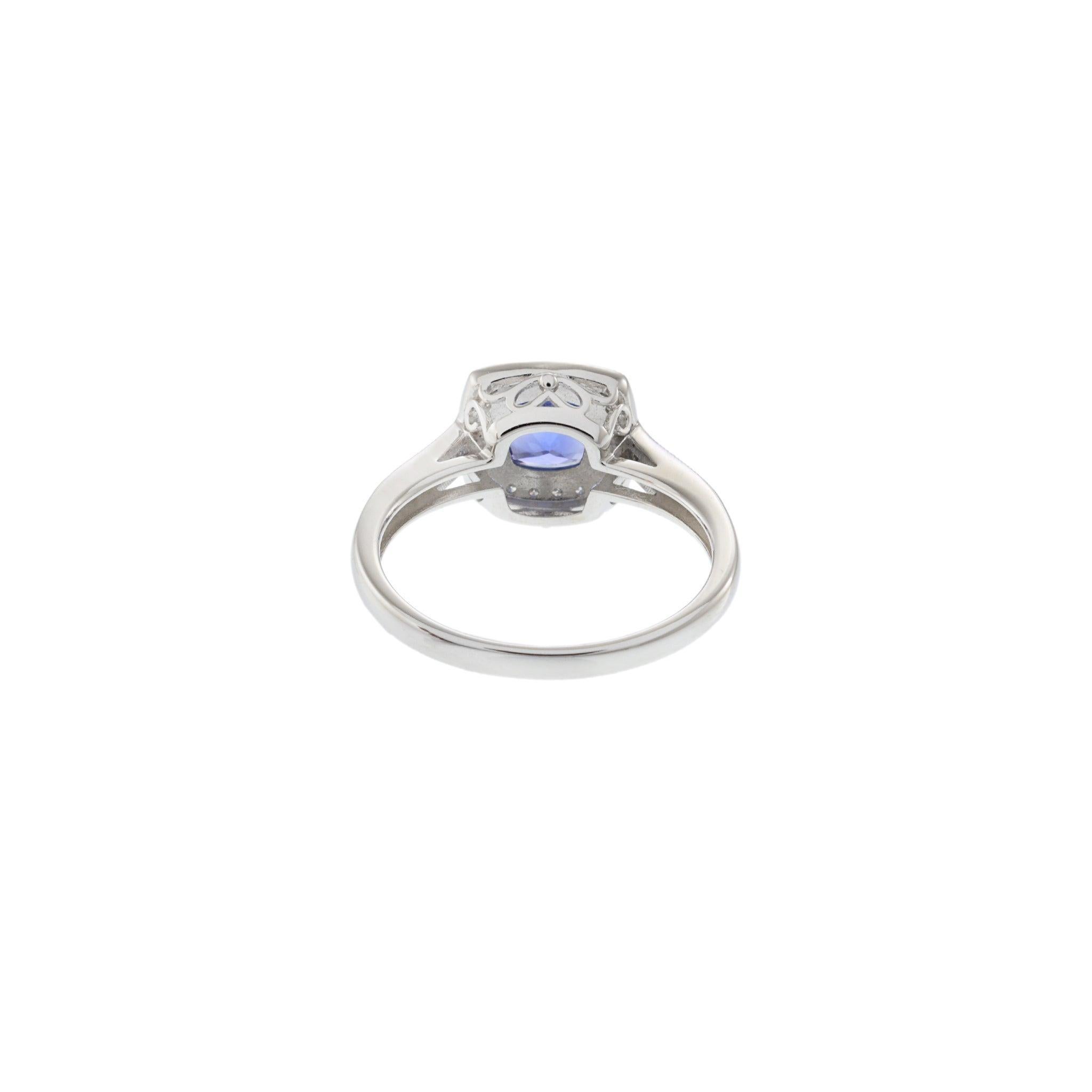 Women's 14KT White Gold Tanzanite and Diamond Halo Ring For Sale