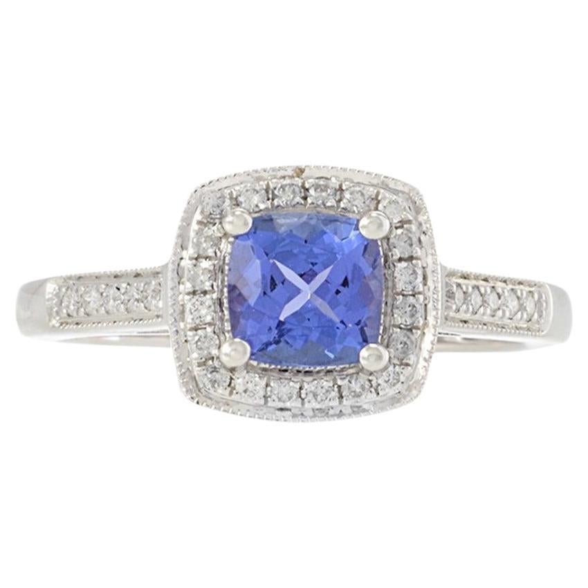 14KT White Gold Tanzanite and Diamond Halo Ring