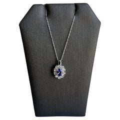 14kt White Gold Tanzanite and Diamond Necklace - 0.55ctw Tanzanite, 0.15ctw Dia
