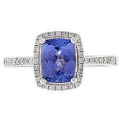 Anillo de oro blanco de 14 quilates con tanzanita y diamantes
