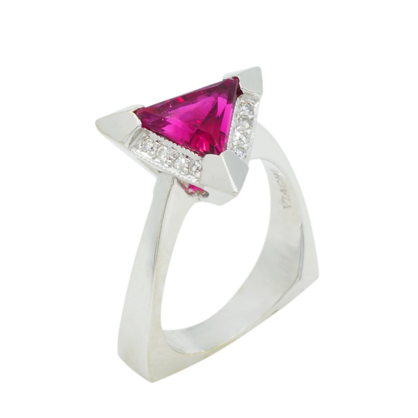 14kt White Gold Trilliant Rubelite and Diamond Ring Designer Viachi. New 14kt white gold 1.67ct triangle rubelite and .12cttw diamond ring designer VIACHI.  This ring is hand crafted with the highest in quality and workmanship. This ring makes a