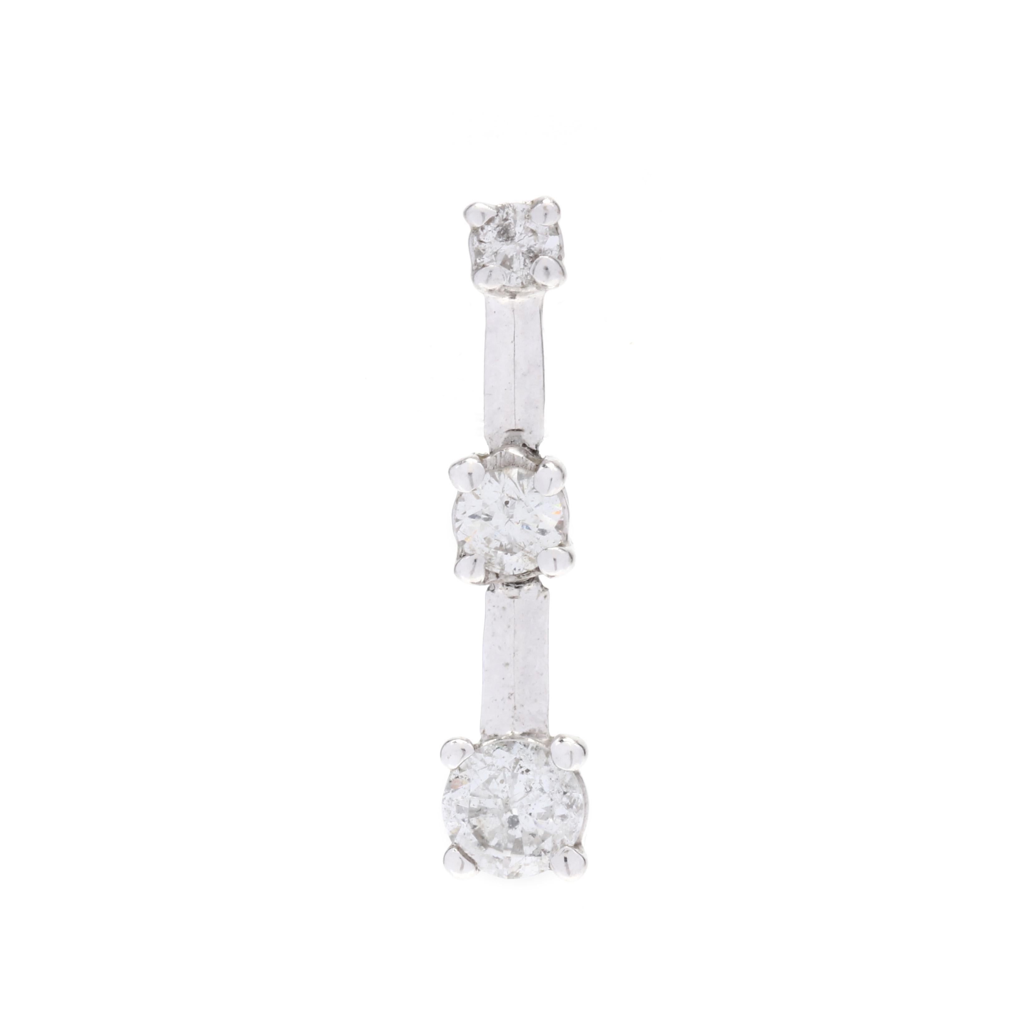 A pair of 14 karat white gold triple diamond earrings. These earrings feature a linear dangle design each set with 3 full cut round diamonds weighing approximately .50 total carats and with pierced post backs.



Stones:

- diamonds, 6 stones

-