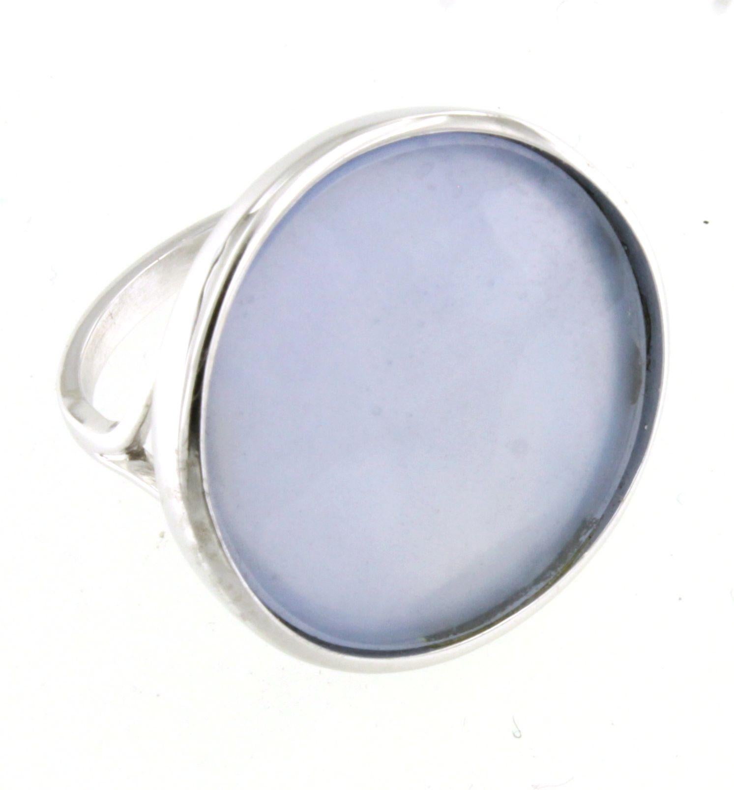Fashion modern cocktail ring in 14kwhite gold with natural  double stone : light blue quartz and mother of pearls  handemade in Italy by Stanoppi Jewellery since 1948.  The stone is a real novelty, designed by the stylist Gisella for her new jewels