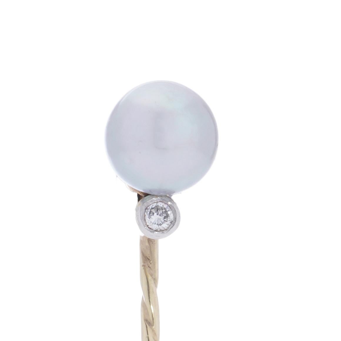 Vintage 14kt. yellow and white gold pin brooch with Tahitian pearl and round brilliant diamond. 
X-Ray has been tested for 14kt. gold. 

Dimensions - 
Size: Length x width x depth: 6.8 x 0.7 x 1.1 cm 
Weight: 2.00 grams

Tahitian pearl - 
Quantity