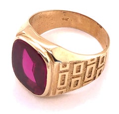 14 Karat Yellow Etched Gold and Garnet Solitaire Fashion Ring