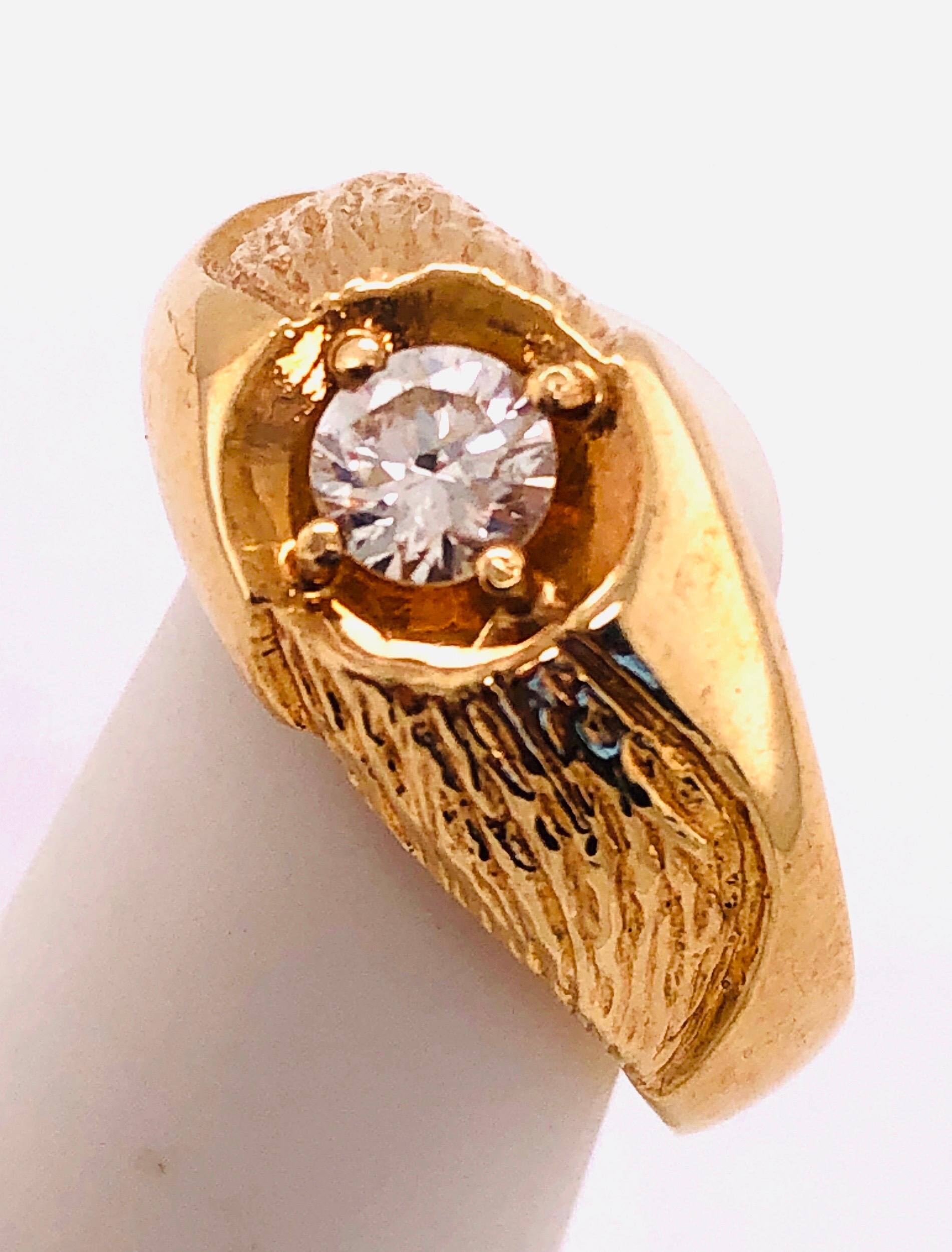 14Kt Yellow Gold Fashion Ring With Solitaire Round Diamond
Size 9
4.70 grams total weight