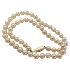 14kt Yellow Gold 18 Inch 7mm Pearl Strand, Knotted, Golden Cream, Fish Clasp