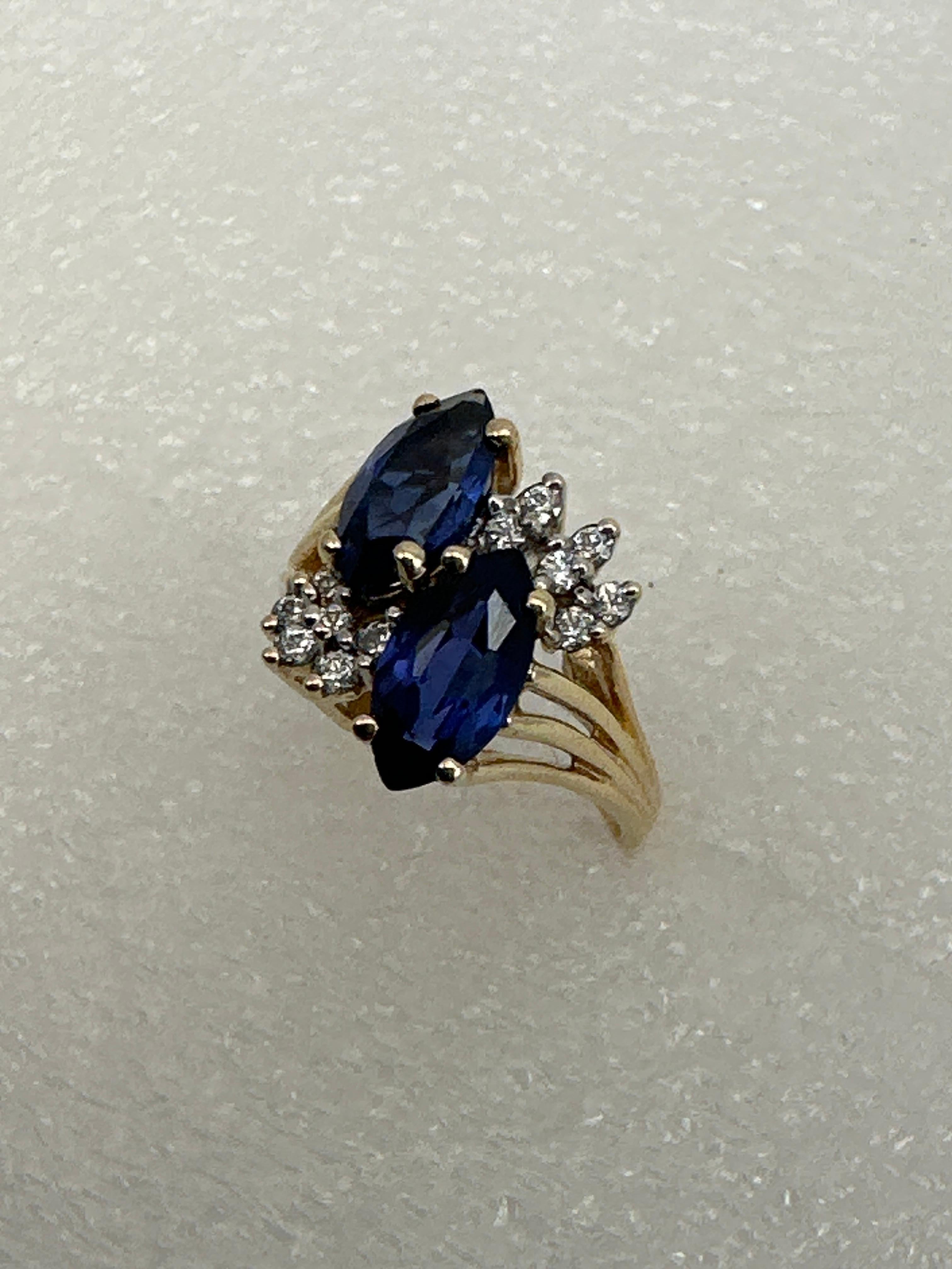 14kt Yellow Gold ~ 2 Sapphire Blue Marquise Stones 12 Diamonds Ring Size 6 1/2 In Excellent Condition For Sale In Las Vegas, NV