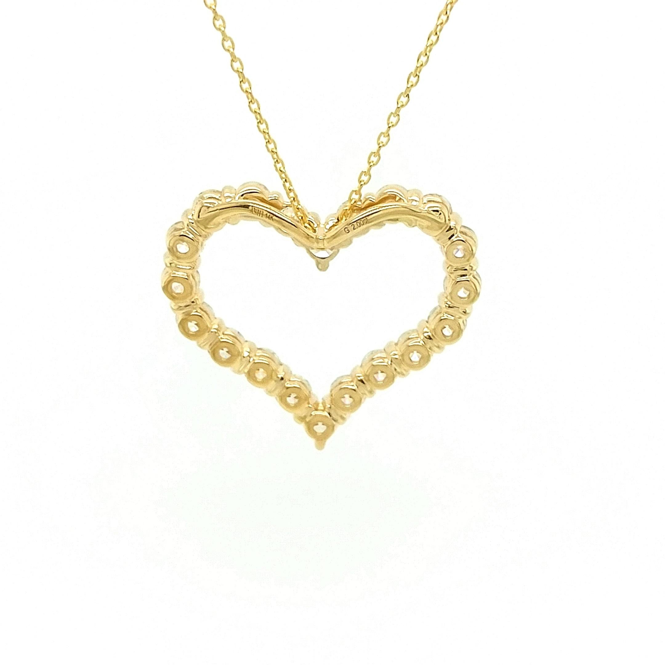 A beautiful yellow gold, diamond heart pendant necklace. A classic heart-shaped pendant set with 20 round brilliant cut diamonds All the stones are prong set. The total diamond weight is 2.00 carat. The diamonds are H-I color and SI1/SI2 clarity.