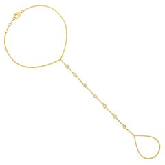 Chaîne à main en or jaune 14 carats avec 7 diamants