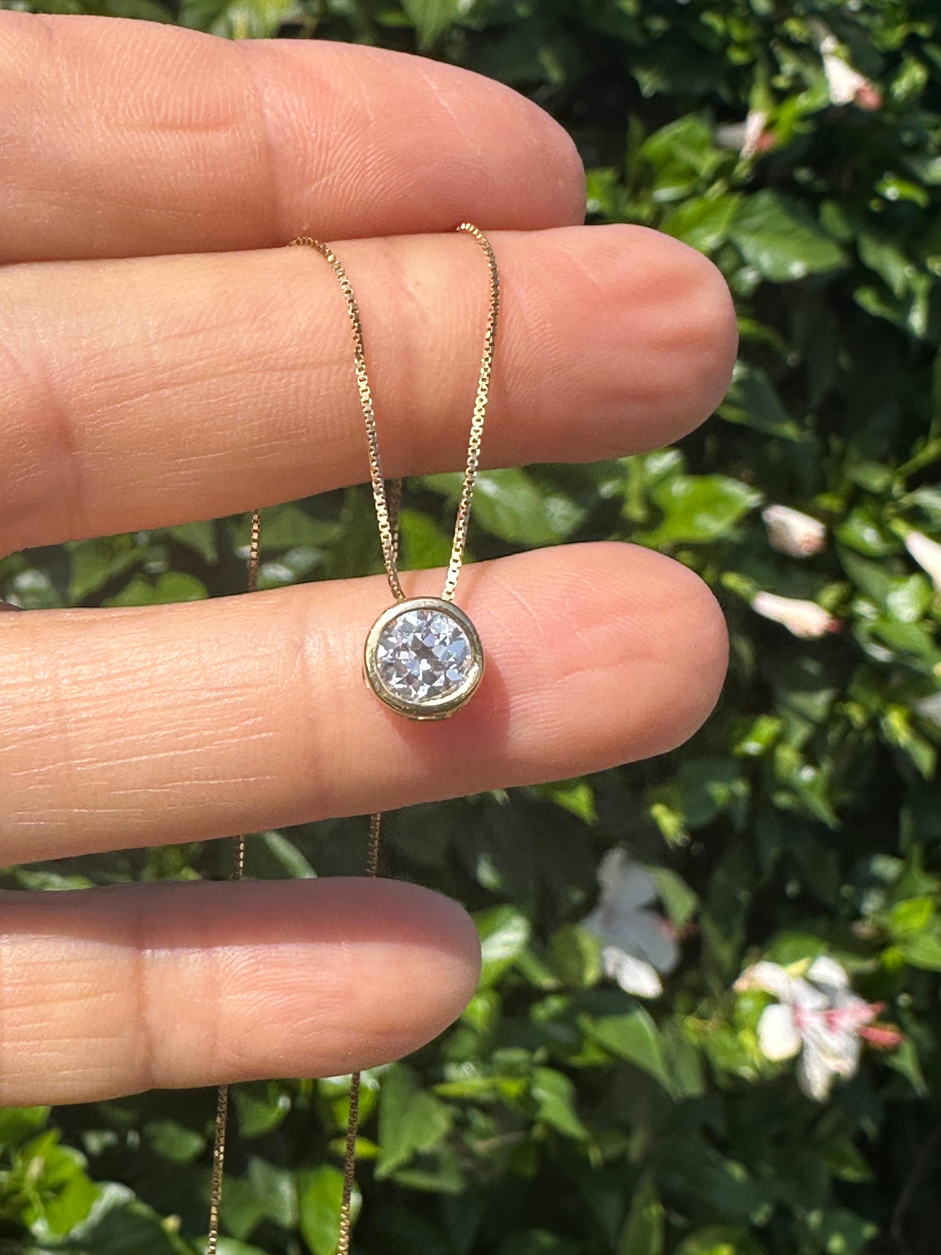 Taille ronde Or jaune 14Kt .98 Carat Round Bezel-Set Natural Diamond en vente