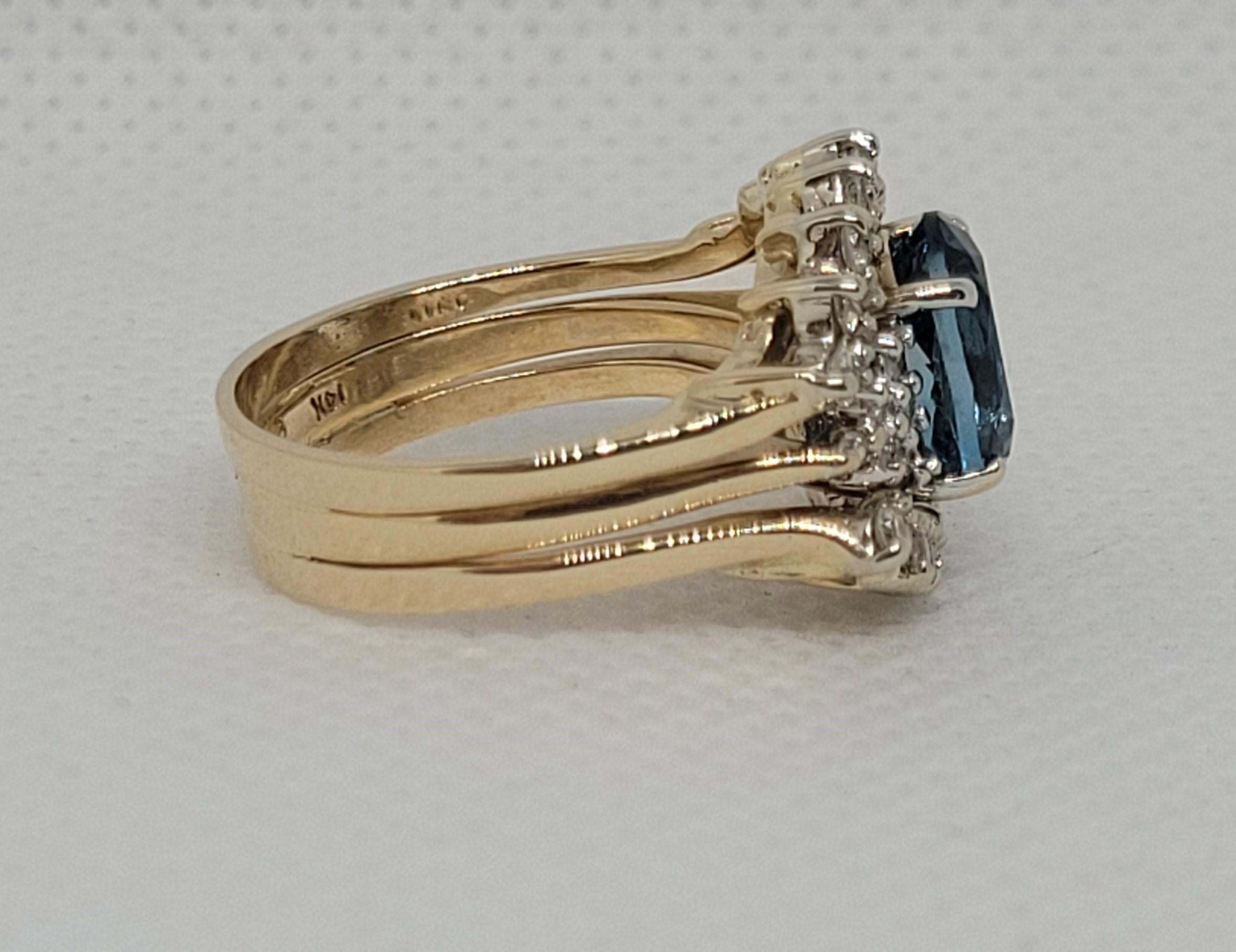 Oval Cut 14kt Yellow Gold 9x7 Oval Blue Topaz .56ctttw Diamond Ring Wrap Size 6, 6.6 gr For Sale