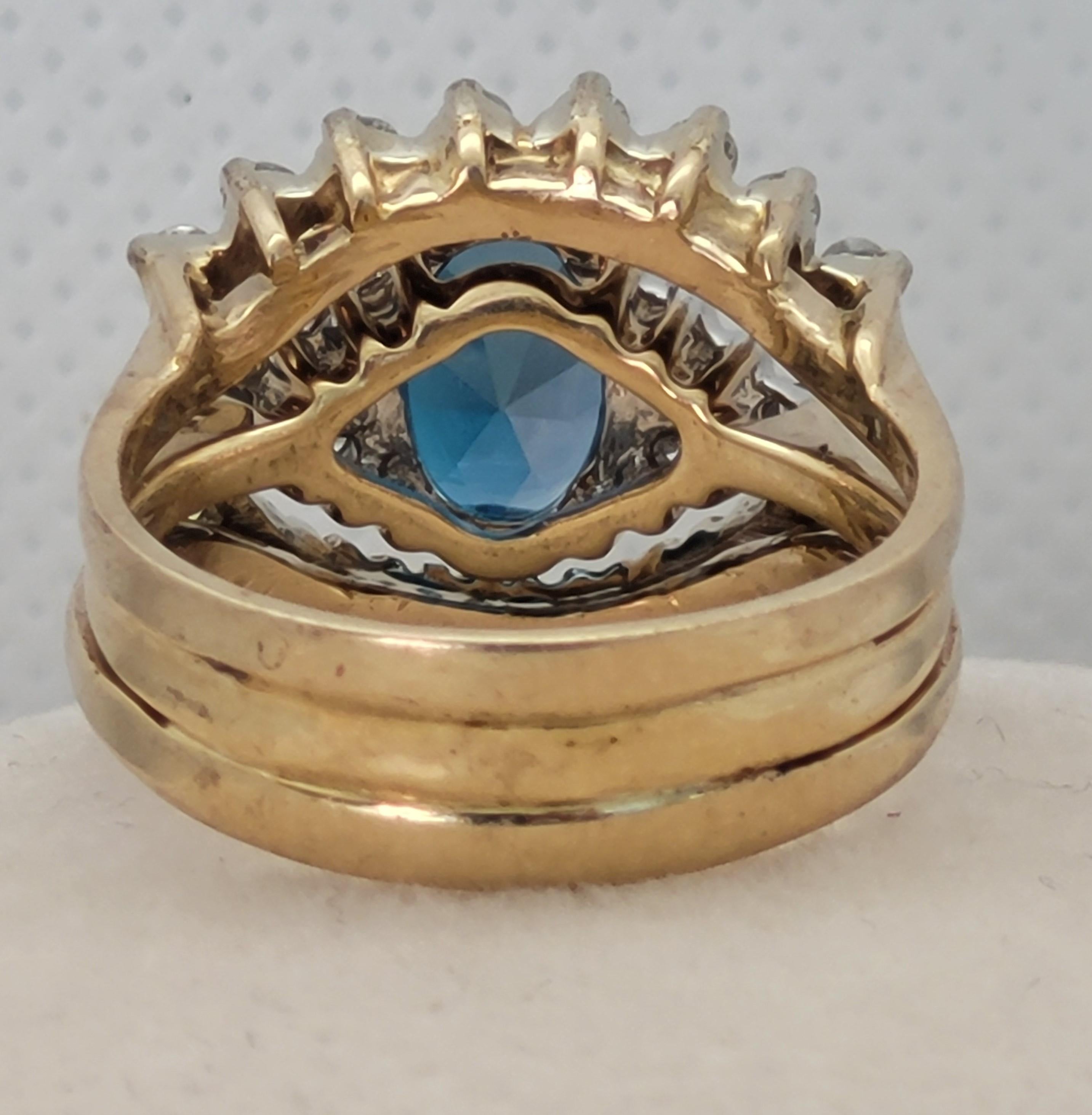 14kt Yellow Gold 9x7 Oval Blue Topaz .56ctttw Diamond Ring Wrap Size 6, 6.6 gr In Good Condition For Sale In San Diego, CA