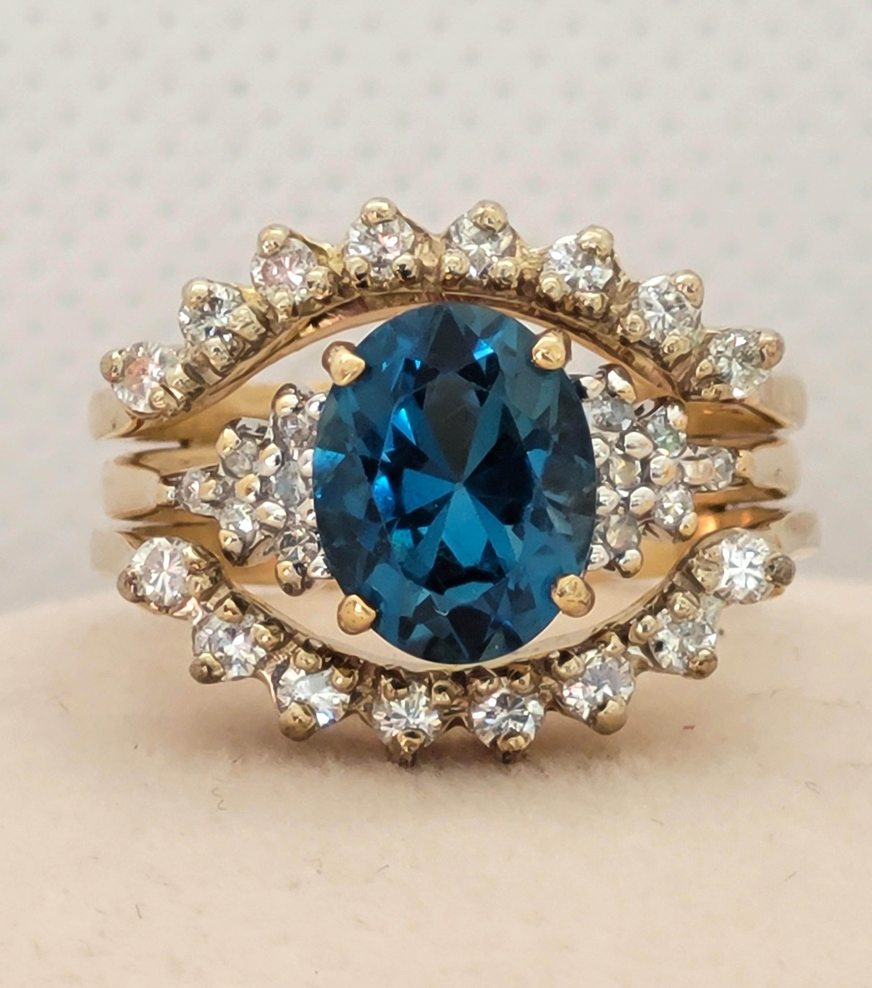 14kt Yellow Gold 9x7 Oval Blue Topaz .56ctttw Diamond Ring Wrap Size 6, 6.6 gr For Sale 1