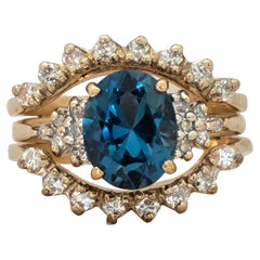 14kt Yellow Gold 9x7 Oval Blue Topaz .56ctttw Diamond Ring Wrap Size 6, 6.6 gr