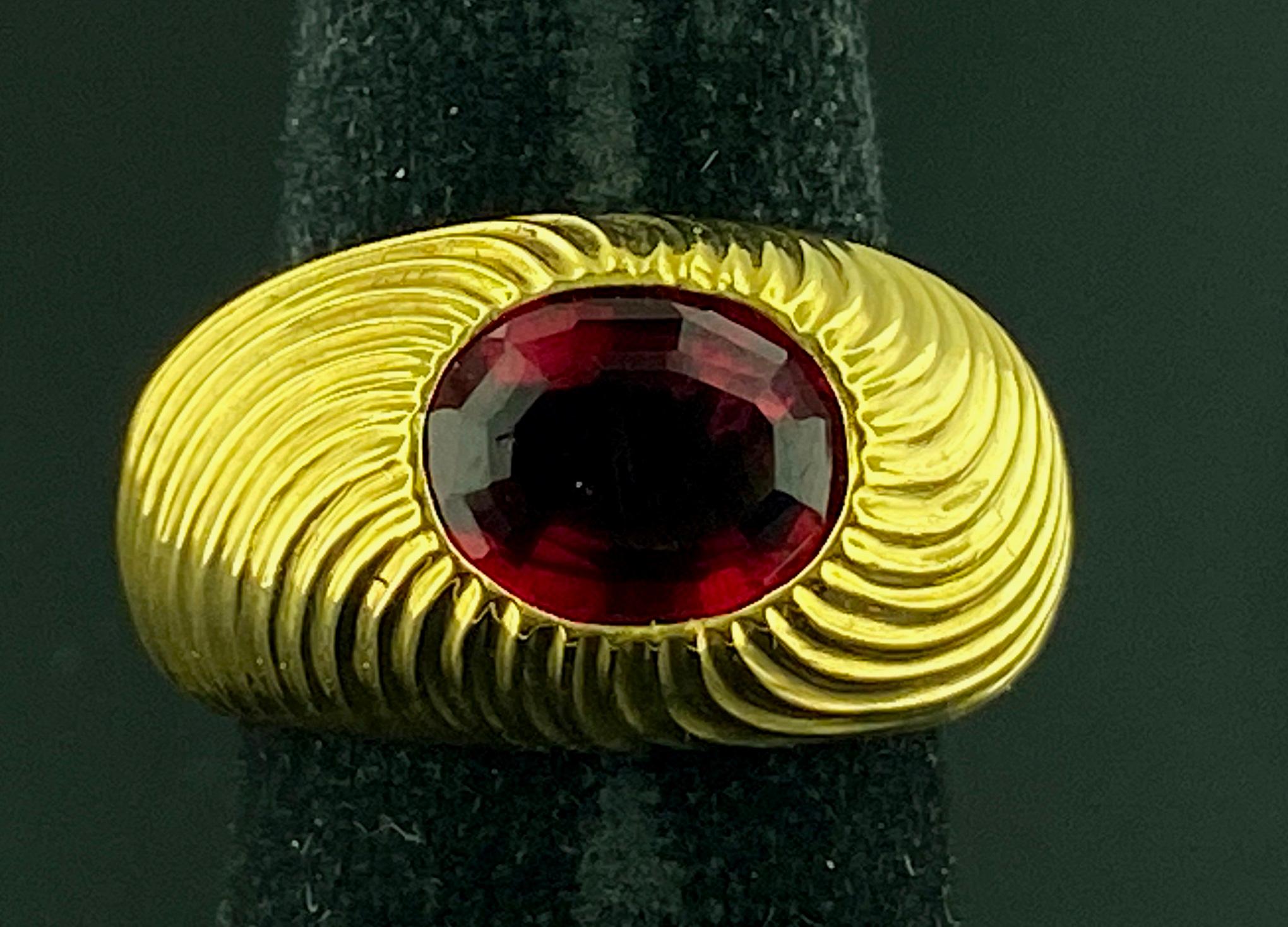 Set in 14 karat yellow gold is an oval shaped 2.05 carat Rubelite Tourmaline.  Ring size is 6.  Gold weight is 16 grams.