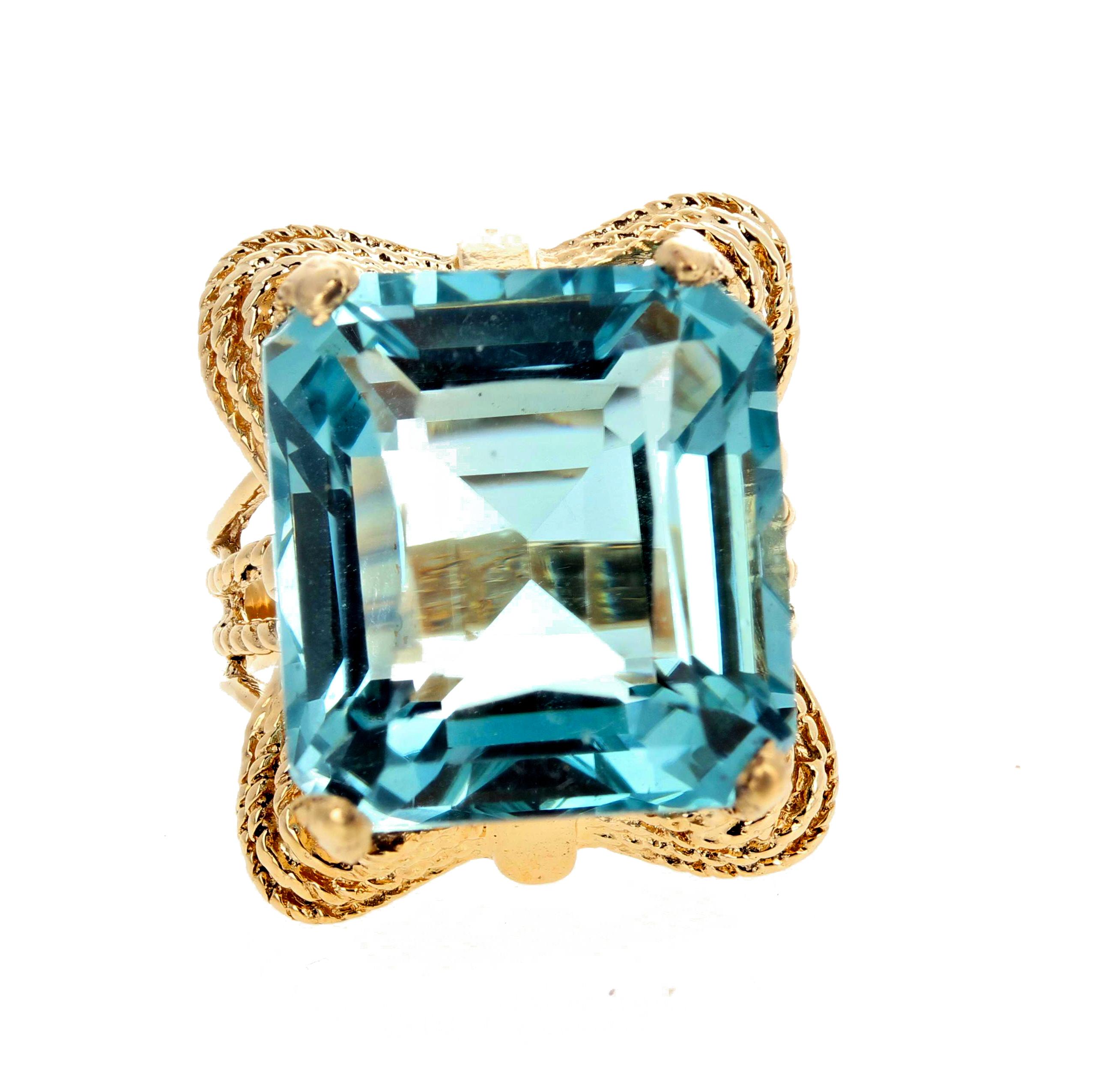 The magnificence and perfection of this Aquamarine is unmatched.  This Cushion cut 19.02 Carat glittering Aquamarine is set in a 14KT yellow gold ring size 7 (sizable).  The Aquamarine is 17 mm x 15 mm.  There are no eye visible inclusions in this