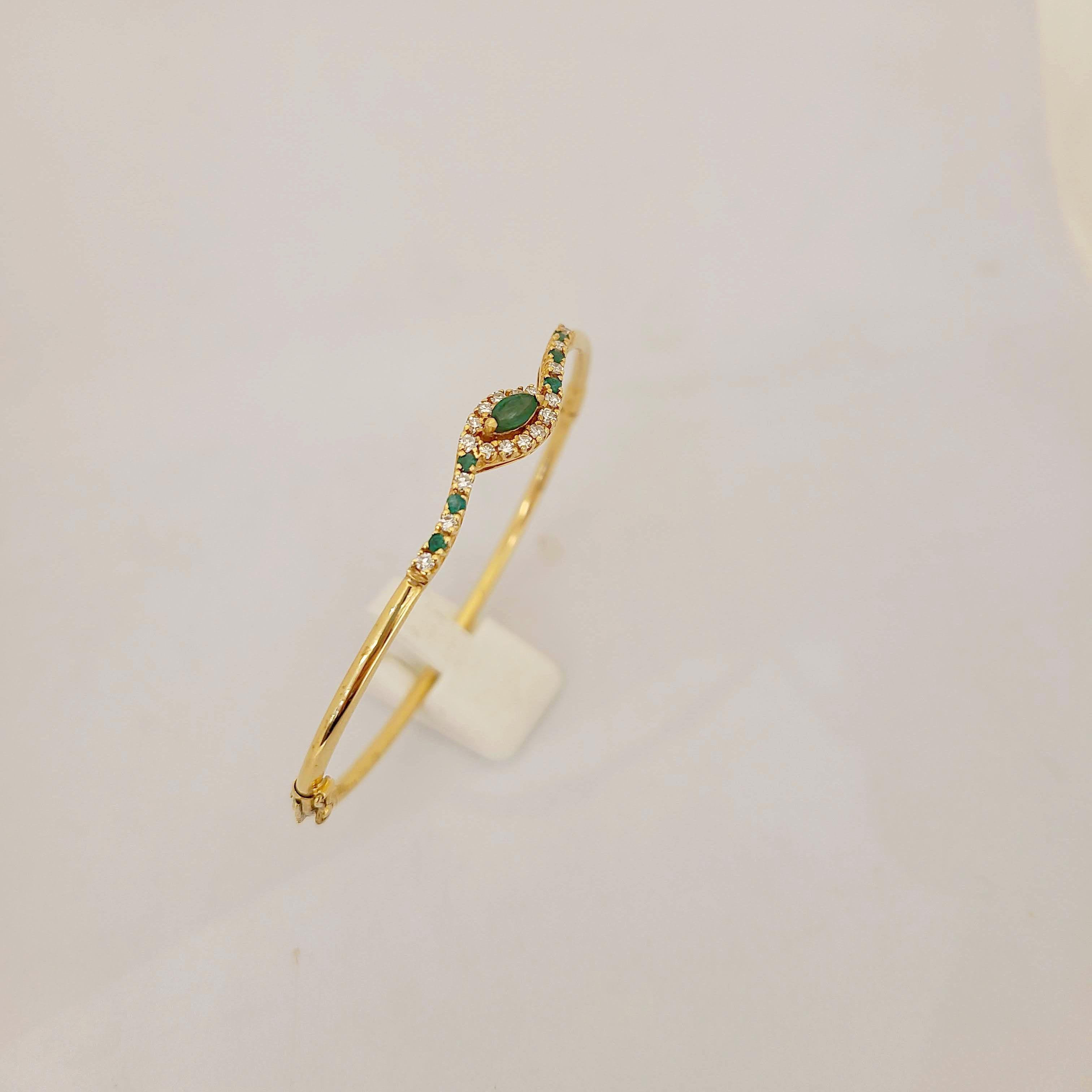 Retro 14 Karat Gold Bangle Bracelet with.85 Carat Emeralds and .33 Carat Diamonds For Sale