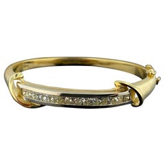 14 Karat Yellow Gold Bangle with Diamonds