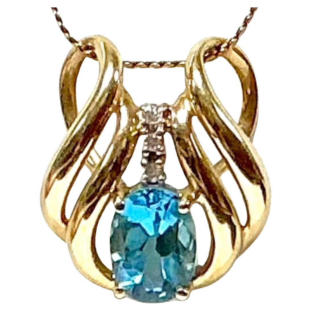 Ciondolo con acquamarina in oro giallo 14kt. 1