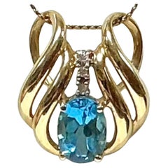 14kt Yellow Gold Blue Topaz With Diamond Pendant