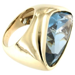 Anillo de compromiso moderno con piedras de topacio azul de oro amarillo de 14 kt