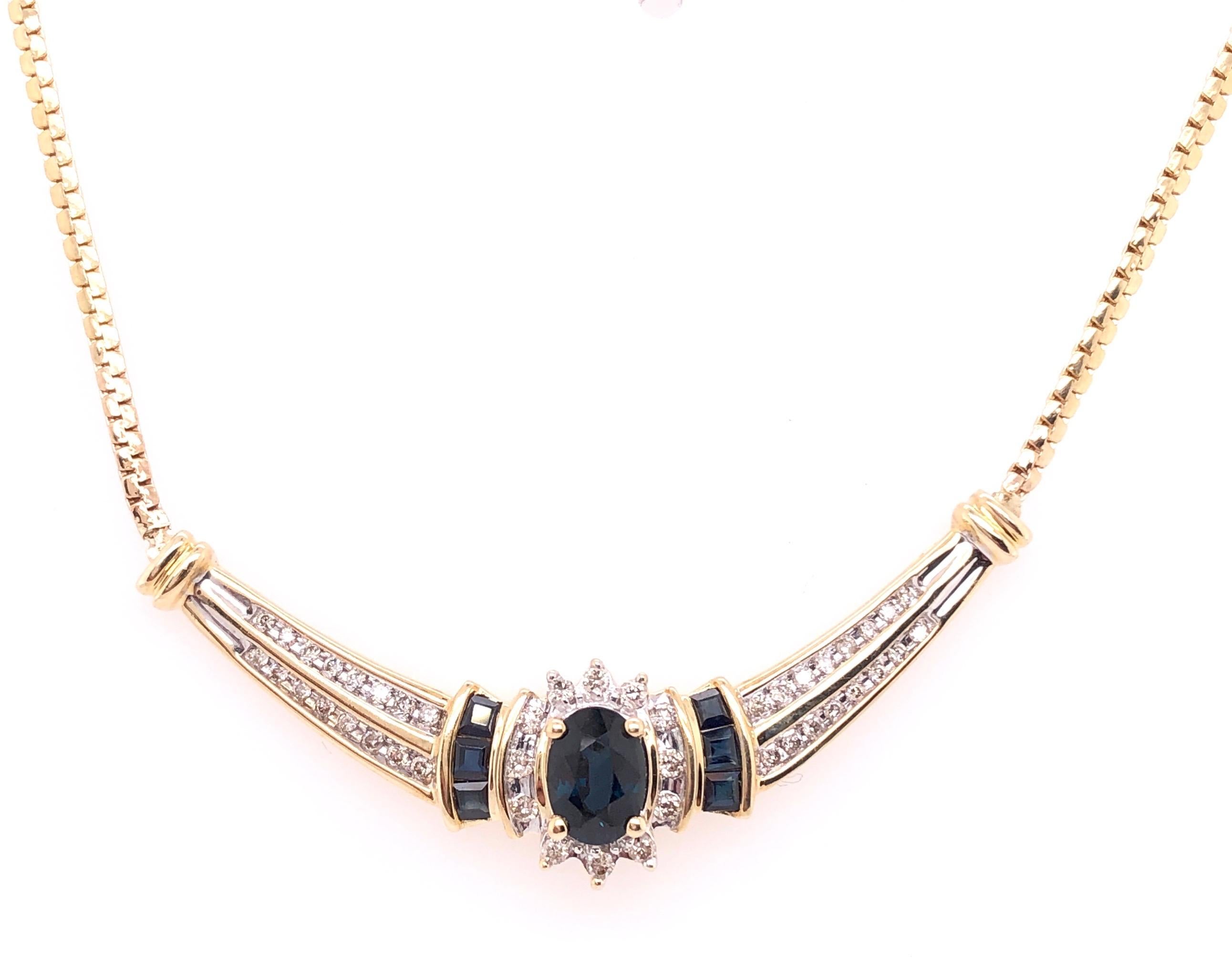 14Kt Yellow Gold Cable Necklace with Oval Sapphire 1.00 Total Diamond Weight
6.6 grams total weight
