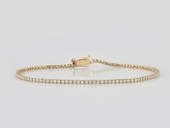 Pulsera tipo «tennis» clásica de oro amarillo de 14 quilates con diamantes de 1,06 quilates engastados en cuatro garras