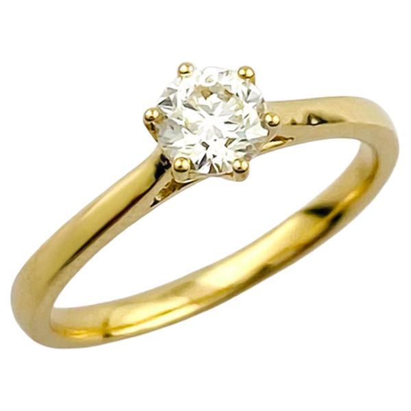 Bague de fiançailles solitaire en or jaune 14KT avec diamant rond classique en vente