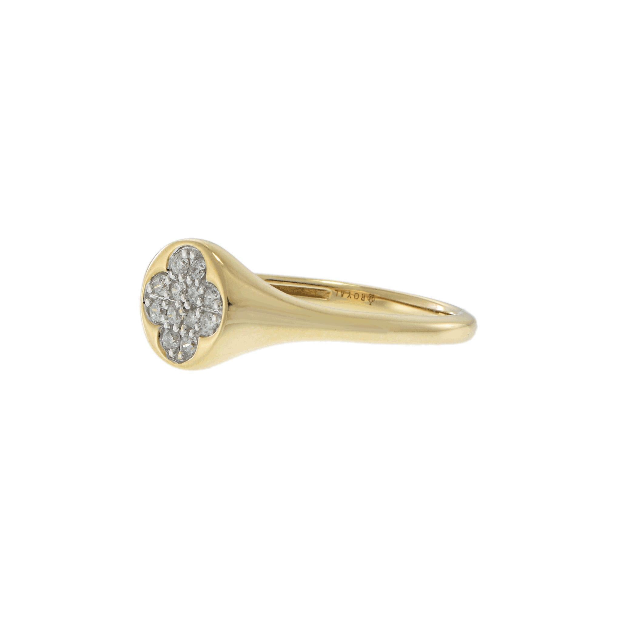 Experience the refined elegance of our exquisite Diamond Signet Ring.

This piece, designed in 14K yellow gold, features a captivating clover-shaped motif adorned with approximately 0.13 carats of round, white diamonds.

The pavé-set diamonds, with
