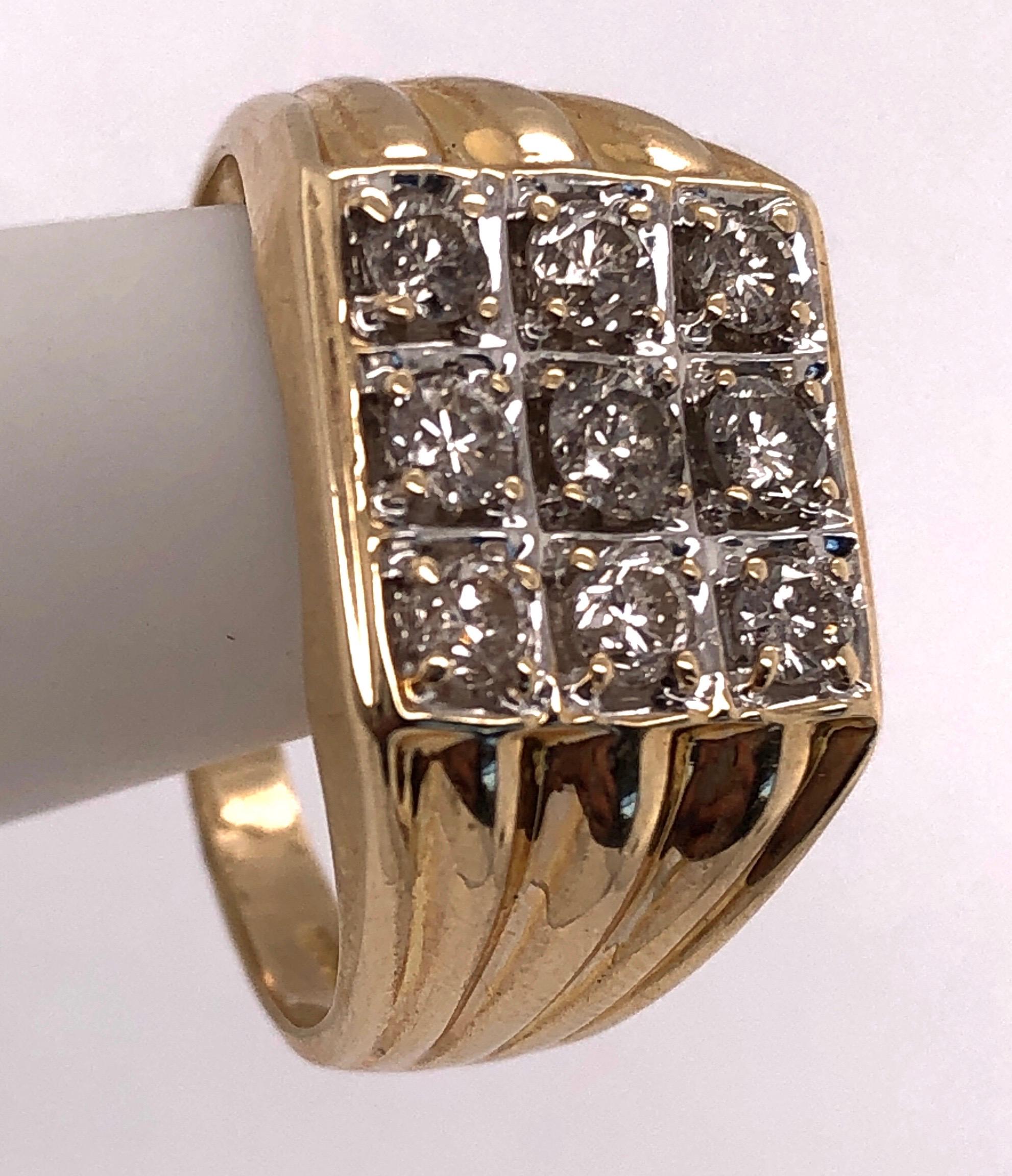 14Kt Yellow Gold Contemporary Ring with 9 Round Diamonds weighing approx 1 Carat. 
9.5 Sized and 5.41 grams total weight.