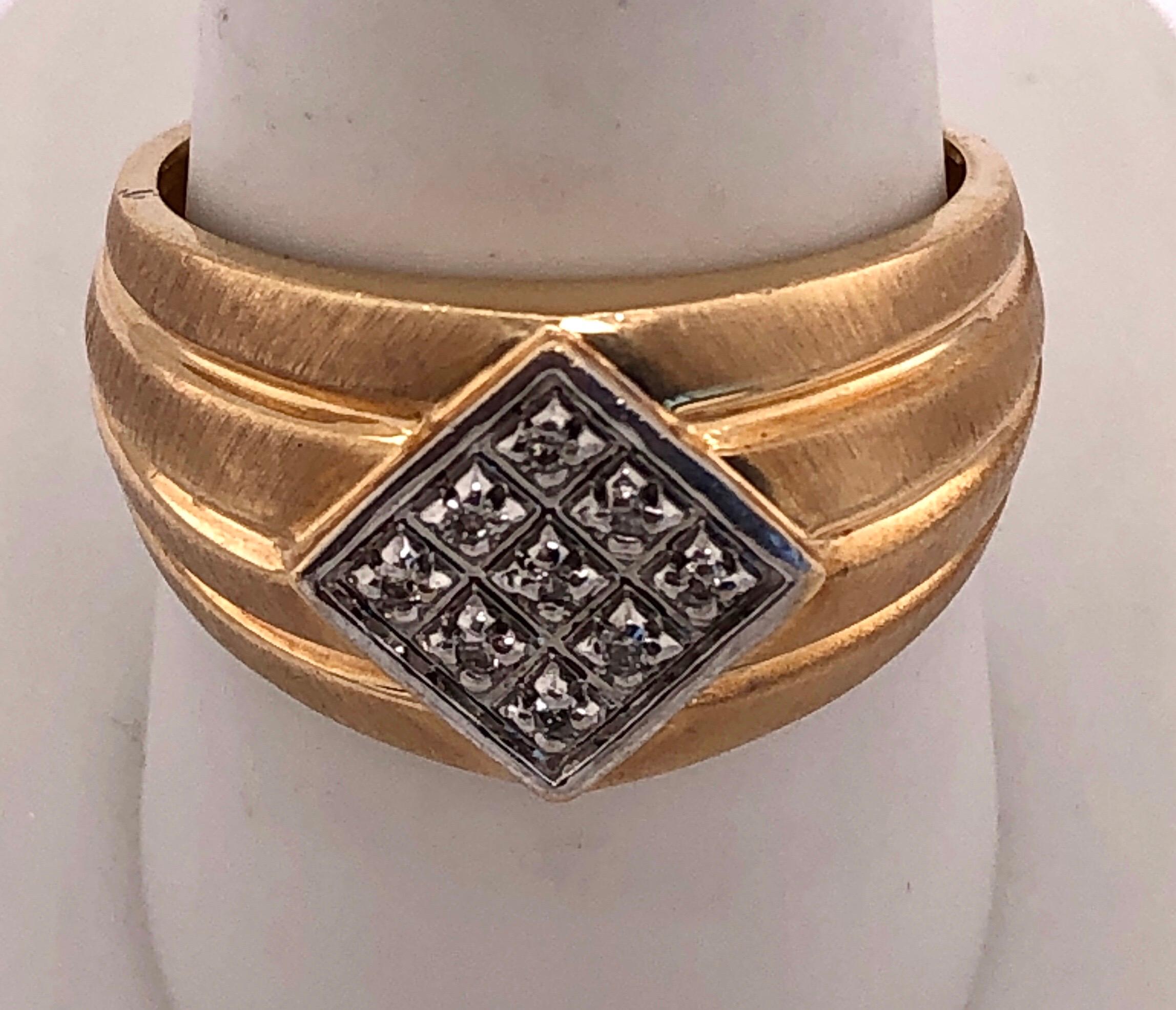 14Kt Yellow Gold Contemporary Ring with Diamonds
Size 9.5 5.40 grams total weight.