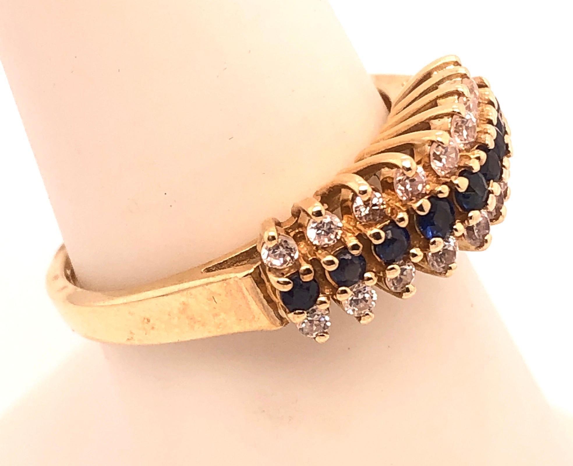 14 Karat Yellow Gold Contemporary Ring with Sapphire and Diamond In Good Condition For Sale In Stamford, CT