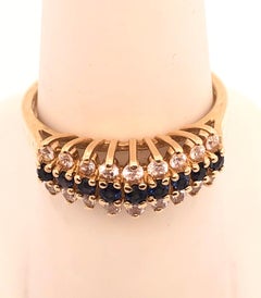 14 Karat Yellow Gold Contemporary Ring with Sapphire and Diamond