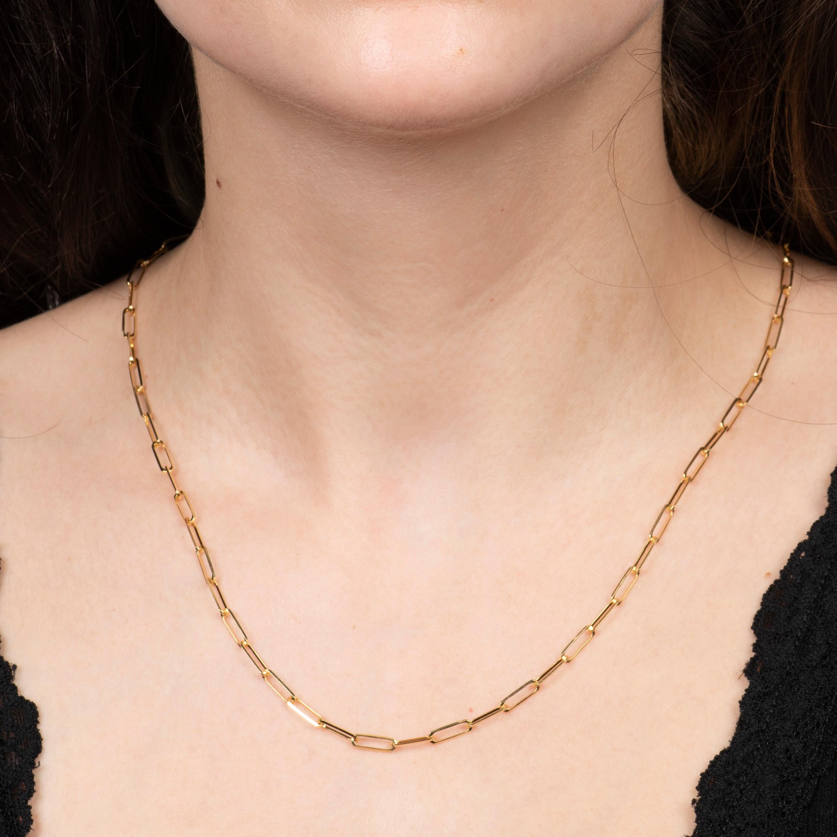 This simple necklace is a 14kt yellow gold, 18 inch paperclip chain necklace. It is the perfect necklace for layering!
