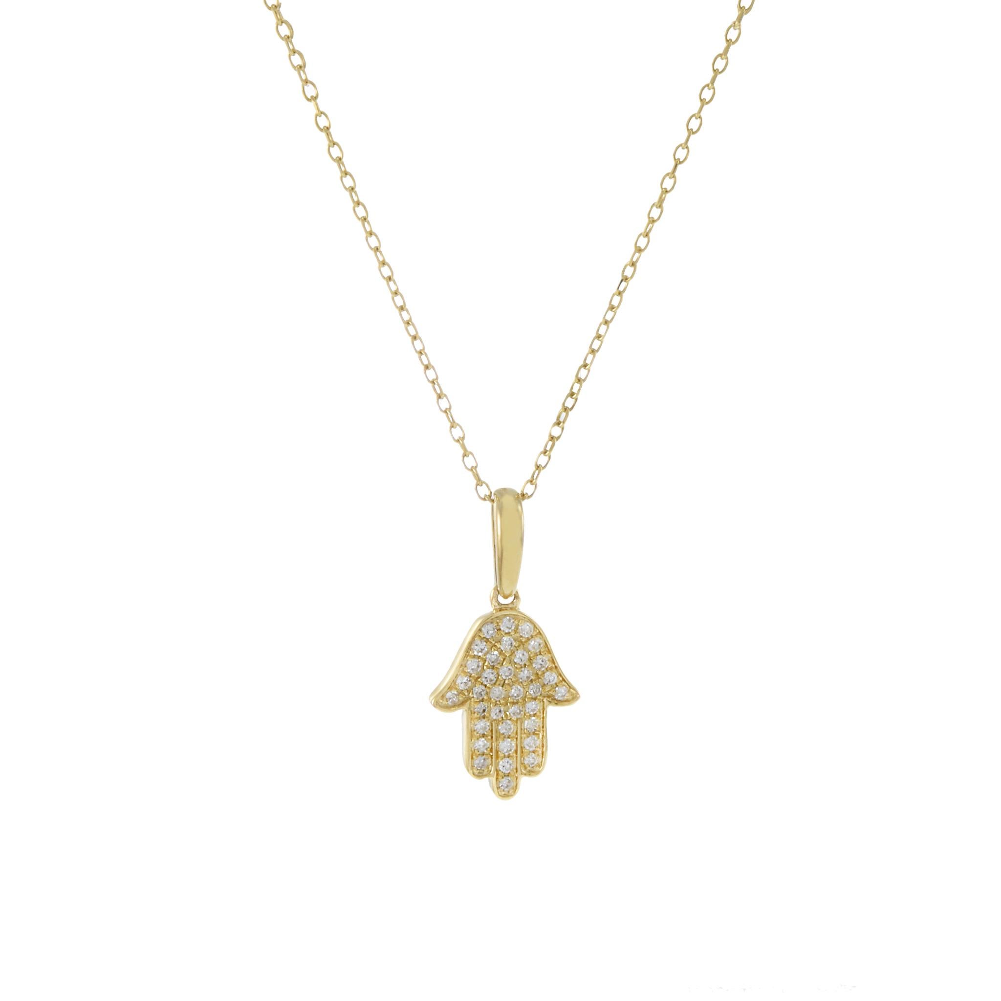 This exquisite Hamsa pendant is crafted with 14KT yellow gold, and each diamond is carefully selected to ensure maximum sparkle and brilliance. With a total of 0.12CT-TW round brilliant cut diamonds, it's sure to make a statement. Length 18 inches.