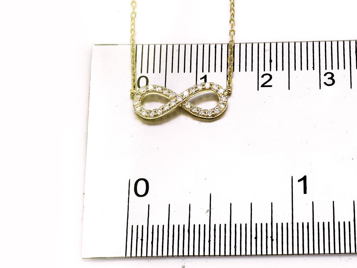 Collier pendentif infini en or jaune 14KT avec diamants en vente 1