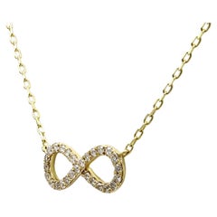 Collier pendentif infini en or jaune 14KT avec diamants